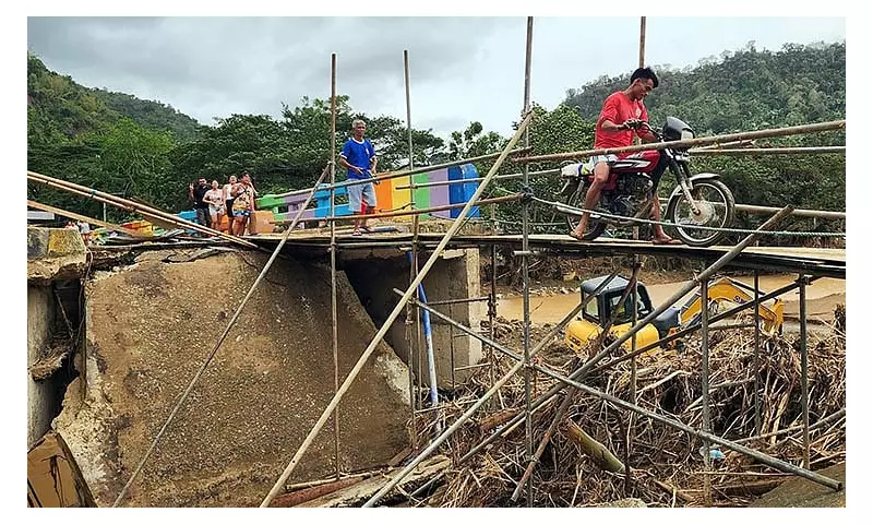 Cebu's Lusaran Isolated After Typhoon Tino Destroys Bridge
