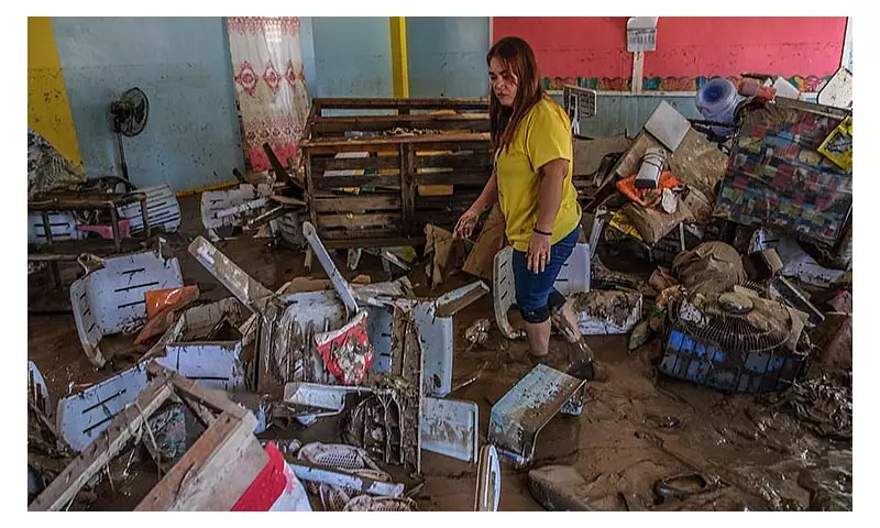 Owak Teachers Salvage Records After Typhoon Tino Floods School