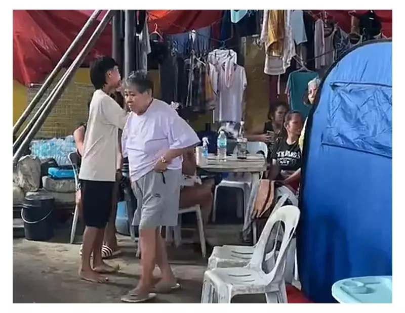 Evacuees in Mandaue City's Umapad Barangay Gym Await Wilma's Exit