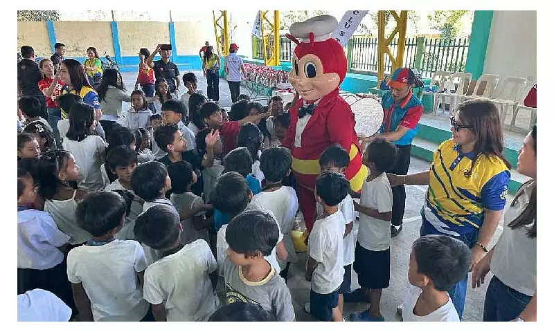 Rotary Clubs Bring Christmas Joy, Nutrition to Bacolor School Children