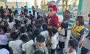 Rotary Clubs Bring Christmas Joy, Nutrition to Bacolor School Children