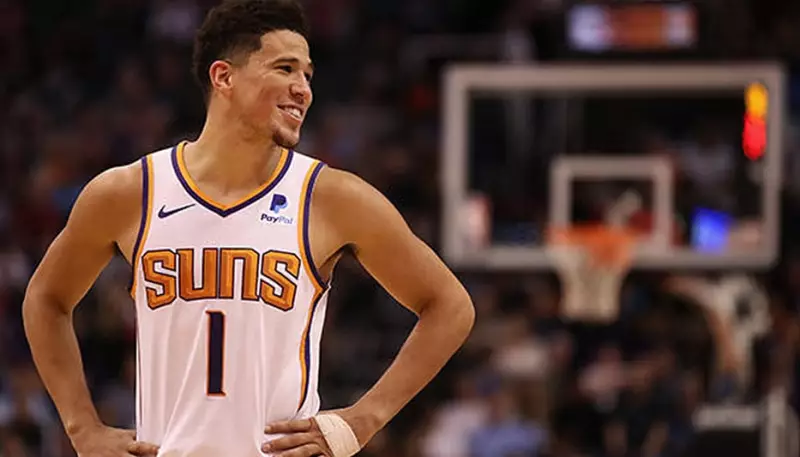 Devin Booker's Ankle Sprain: Phoenix Suns Await Star Guard's Return Next Week