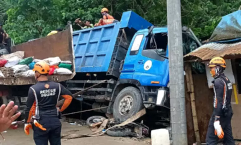 Garbage Truck Accident in Consolacion: Brake Failure Leads to Crash and Transfer of Waste