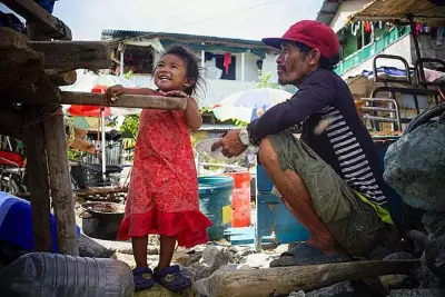 A Father's Journey: Kenneth Bayutas and Daughter Niña Live and Work on E-Bike