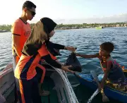 Philippine Coast Guard Delivers Aid to Sulu Fishermen During Maritime Patrol