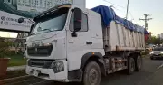 Driver trapped after van rear-ends garbage truck in SRP, Cebu