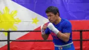 Manny Pacquiao Cheered by Fans at NBA Game Amid Boxing Rematch Preparations