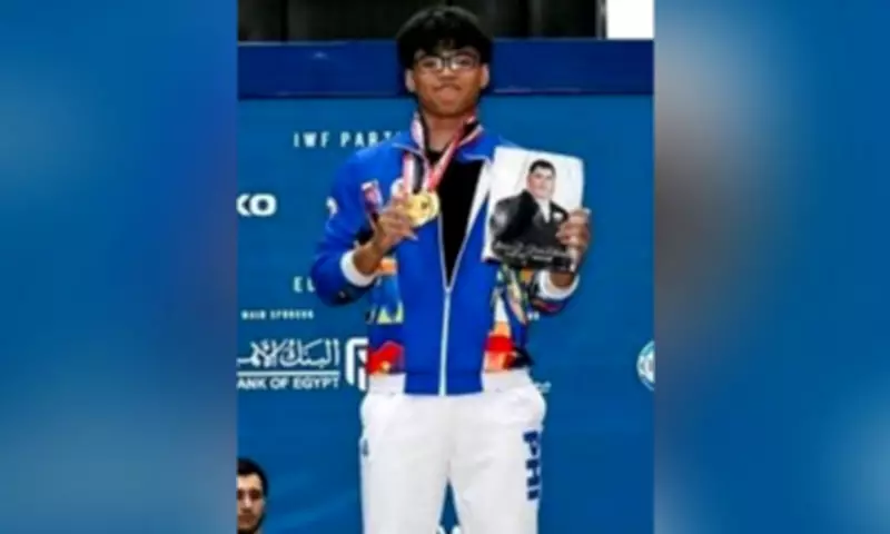 Filipino teen weightlifter Albert delos Santos breaks junior world record, wins gold