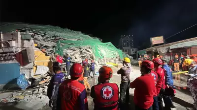 DOLE Sec. Tolentino Inspects Building Collapse Site in Angeles