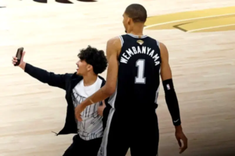 NBA Bans 2 Fans for Life After Court Invasion in Game 1