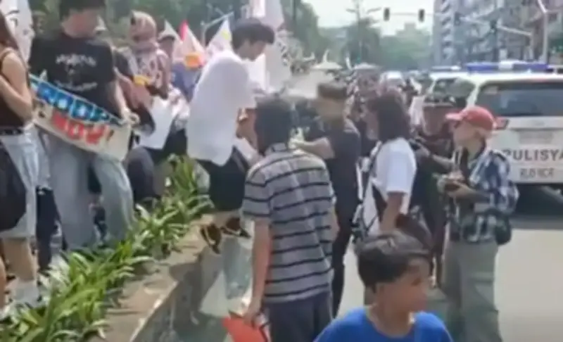 Undercover Police Officer Sprayed with Paint at Manila Independence Day Rally